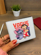 White wallet with cartoon characters and 'Vogue' text held by a hand on a wooden surface.