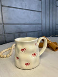 red bow mug